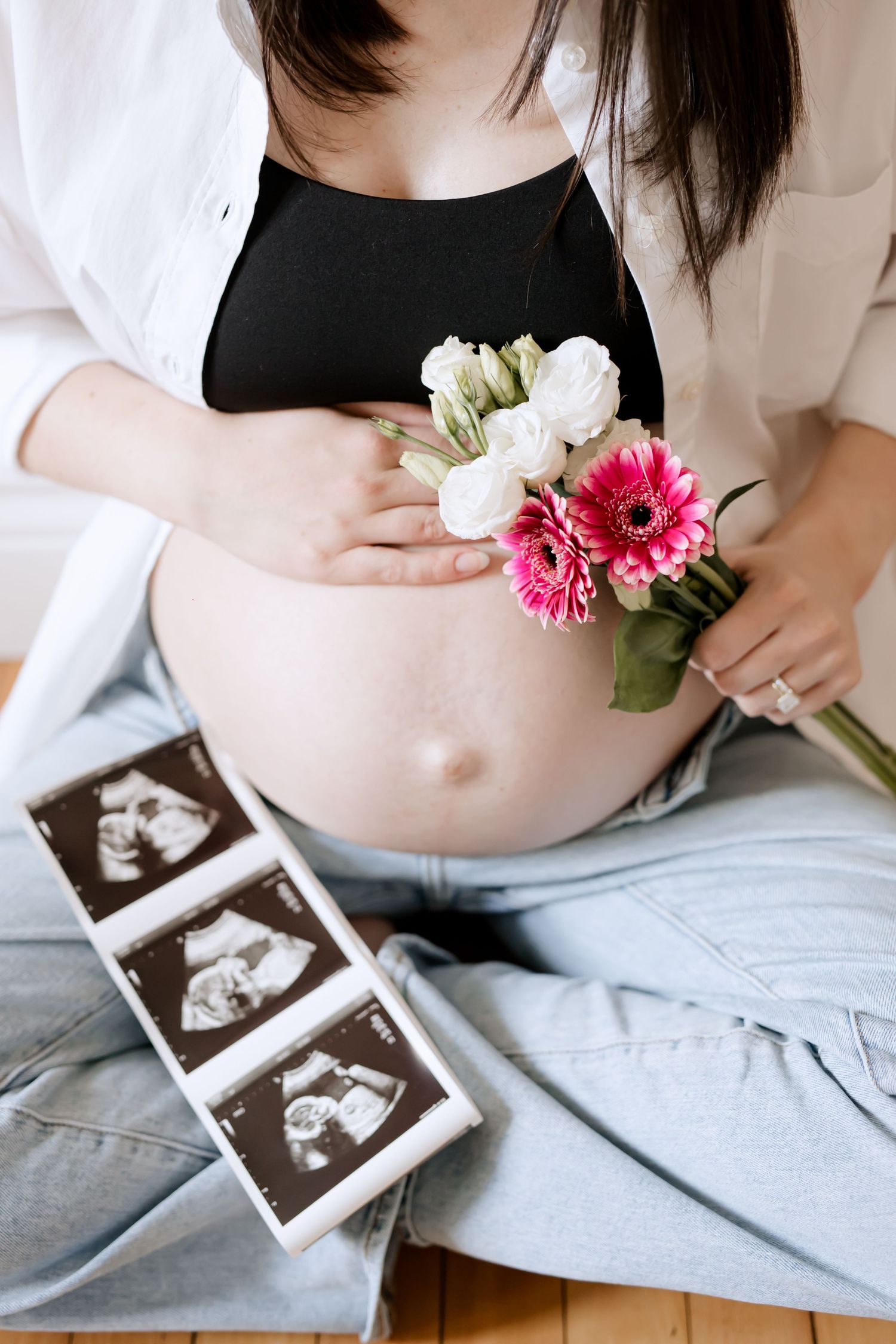 Grimsby Photographer. In studio boudoir maternity session. Bright and airy.
