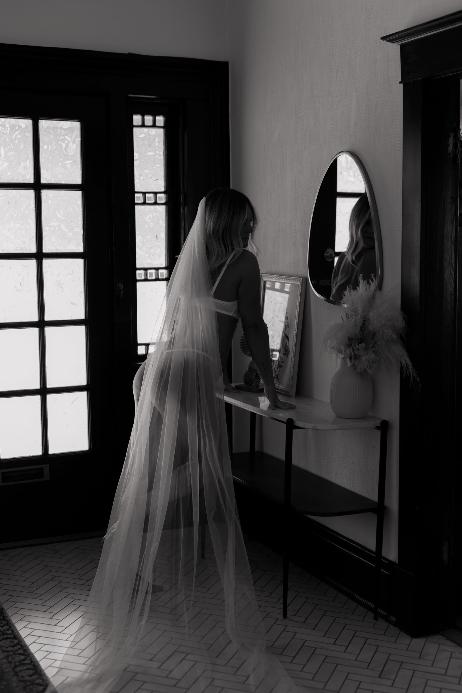Grimsby Photographer. In studio boudoir photo session. Moody black & white. Bridal Boudoir