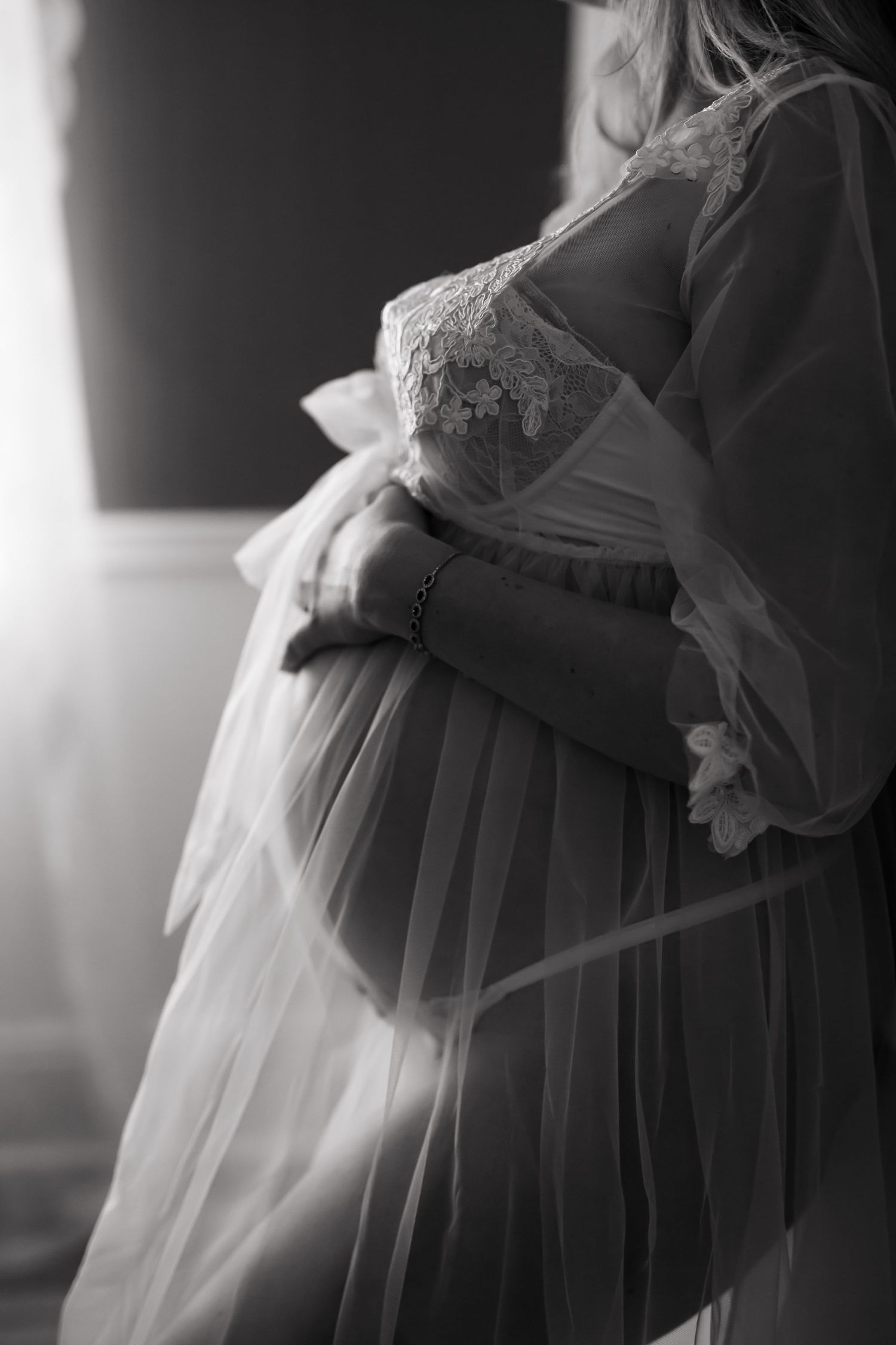 Grimsby Photographer. In studio boudoir maternity session. Bright and airy.