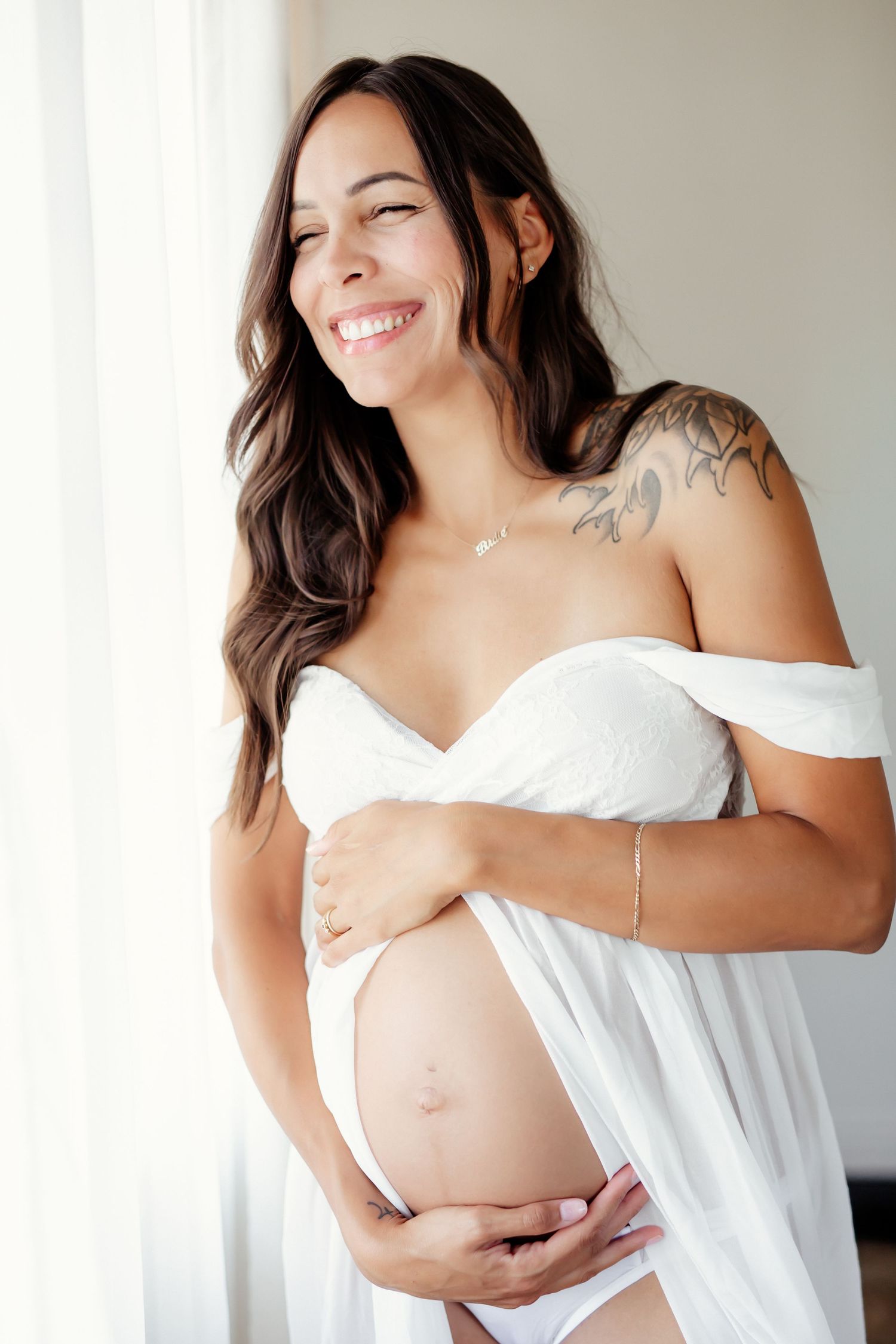Grimsby Photographer. In studio boudoir maternity session. Bright and airy.