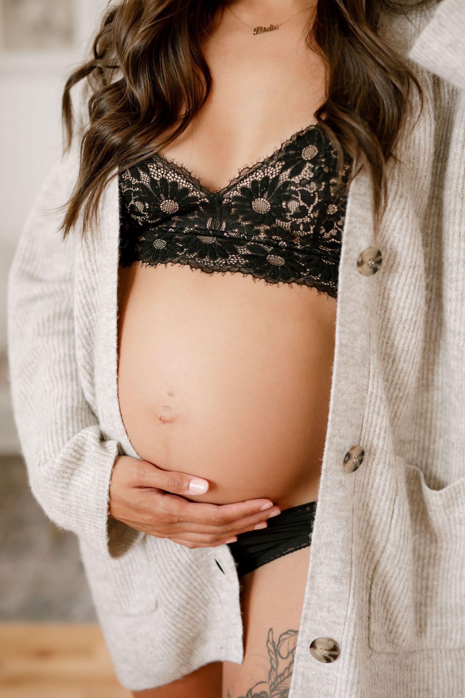 Grimsby Photographer. In studio boudoir maternity session. Bright and airy.