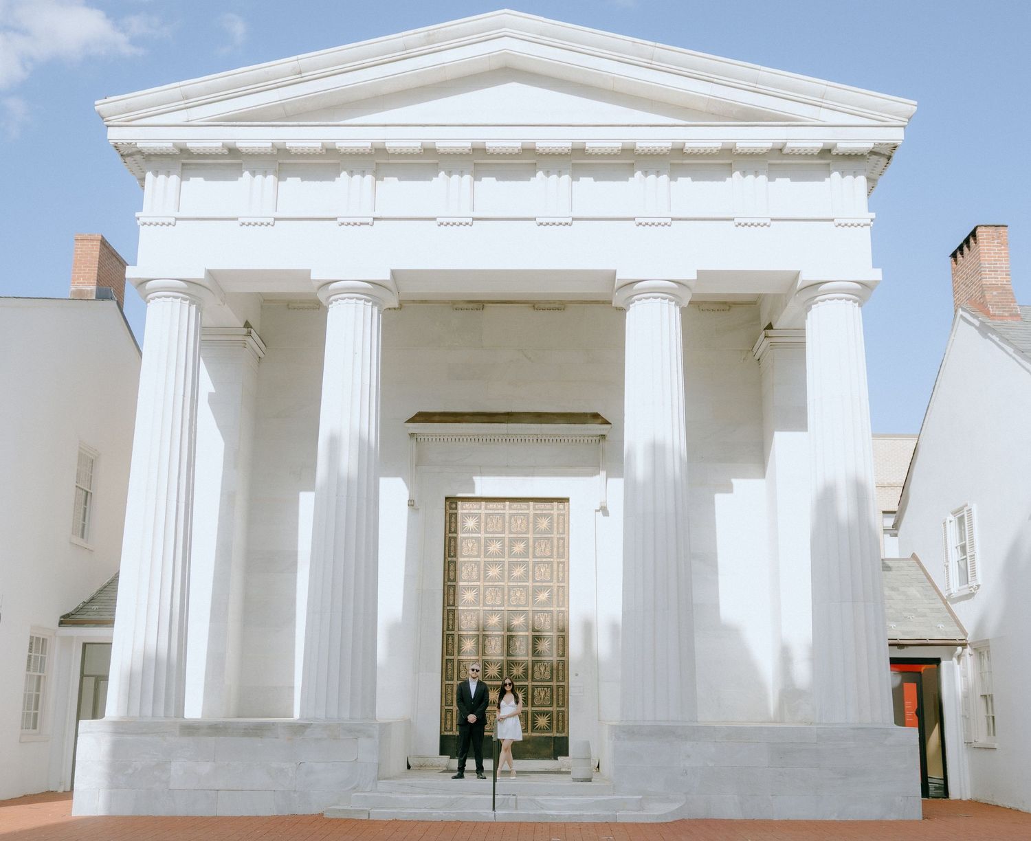 Series of architectural images showing a white neoclassical building with grand columns and portico details.