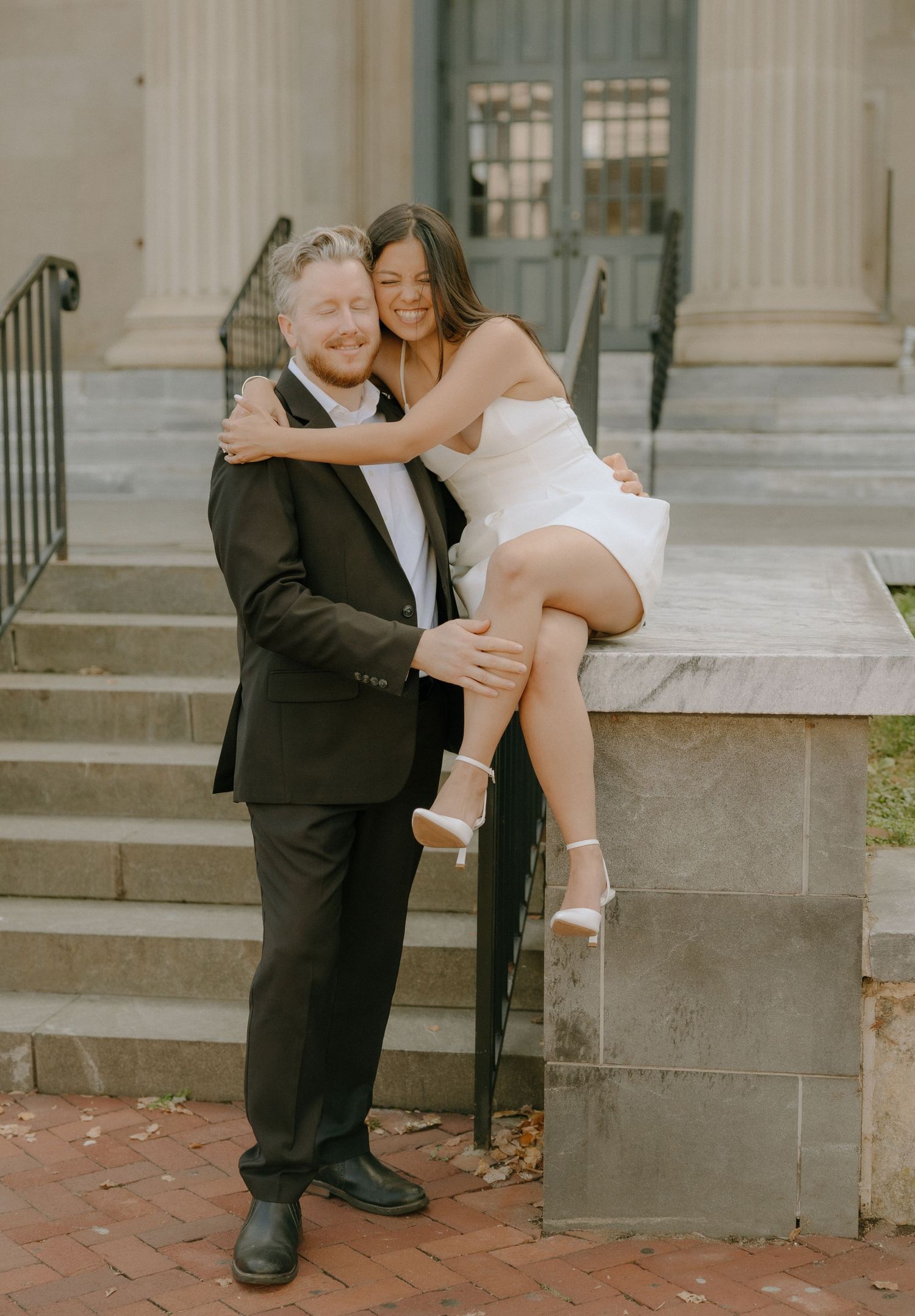 Playful photo sequence on courthouse steps showing a couple's candid interaction.
