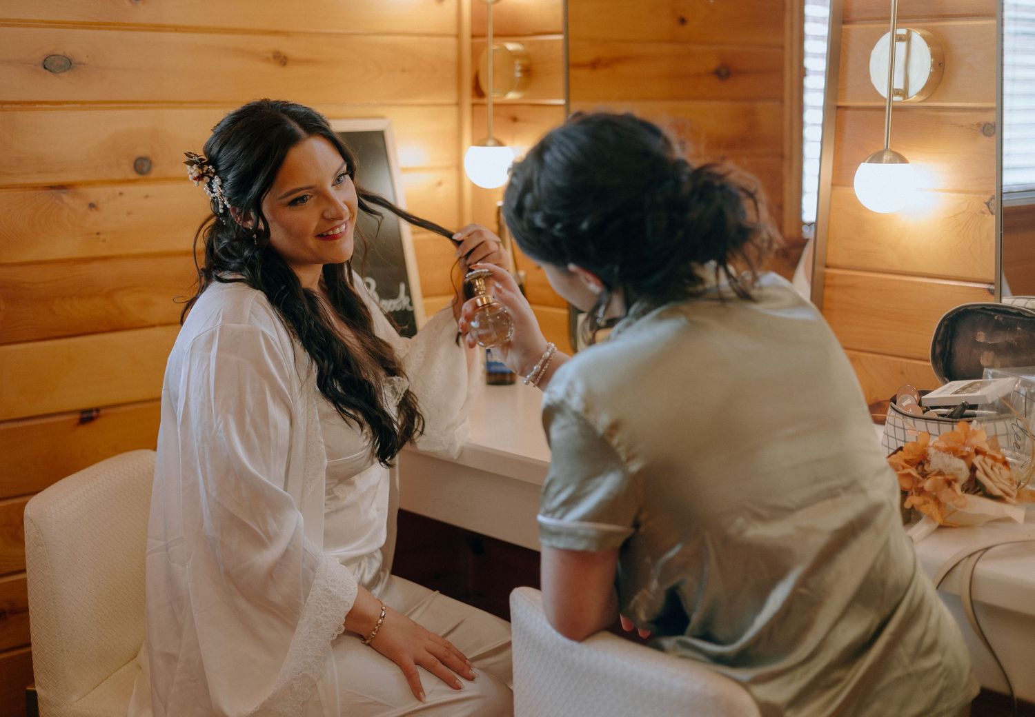 Healthcare provider in white coat examines patient in a wooden-paneled medical office setting.