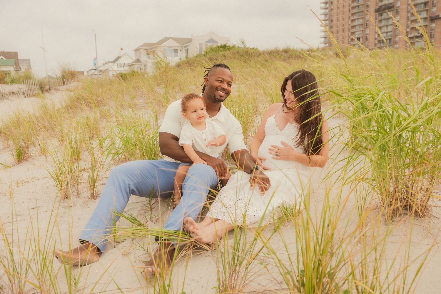 A series of intimate family photos taken in tall beach grass during sunset.