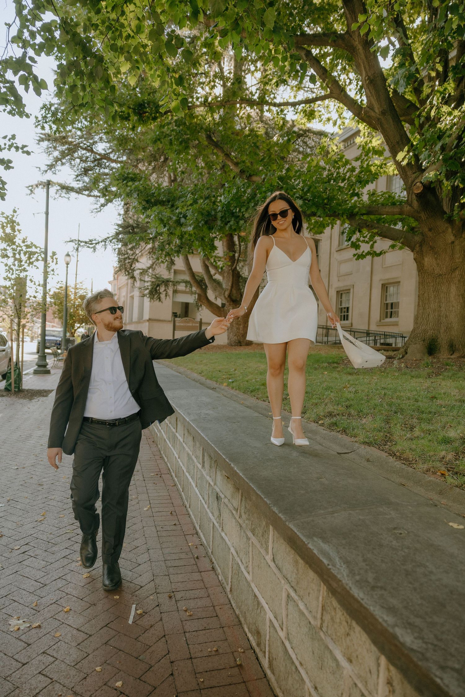 Photo sequence along a tree-lined brick pathway showing movement and walking poses.