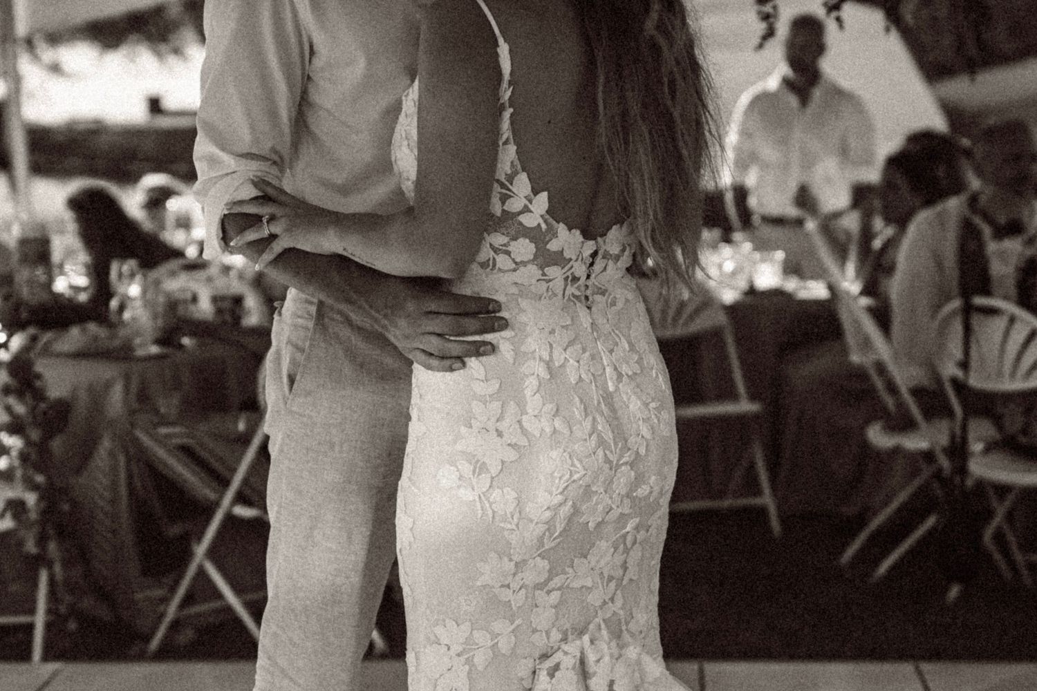 A sequence of black and white wedding reception photos showing dancing couples and joyful celebration moments.