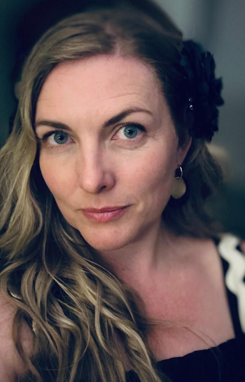 Collection of professional portrait photographs with dramatic lighting at Gabriella Aranky Photography studio, Auckland.