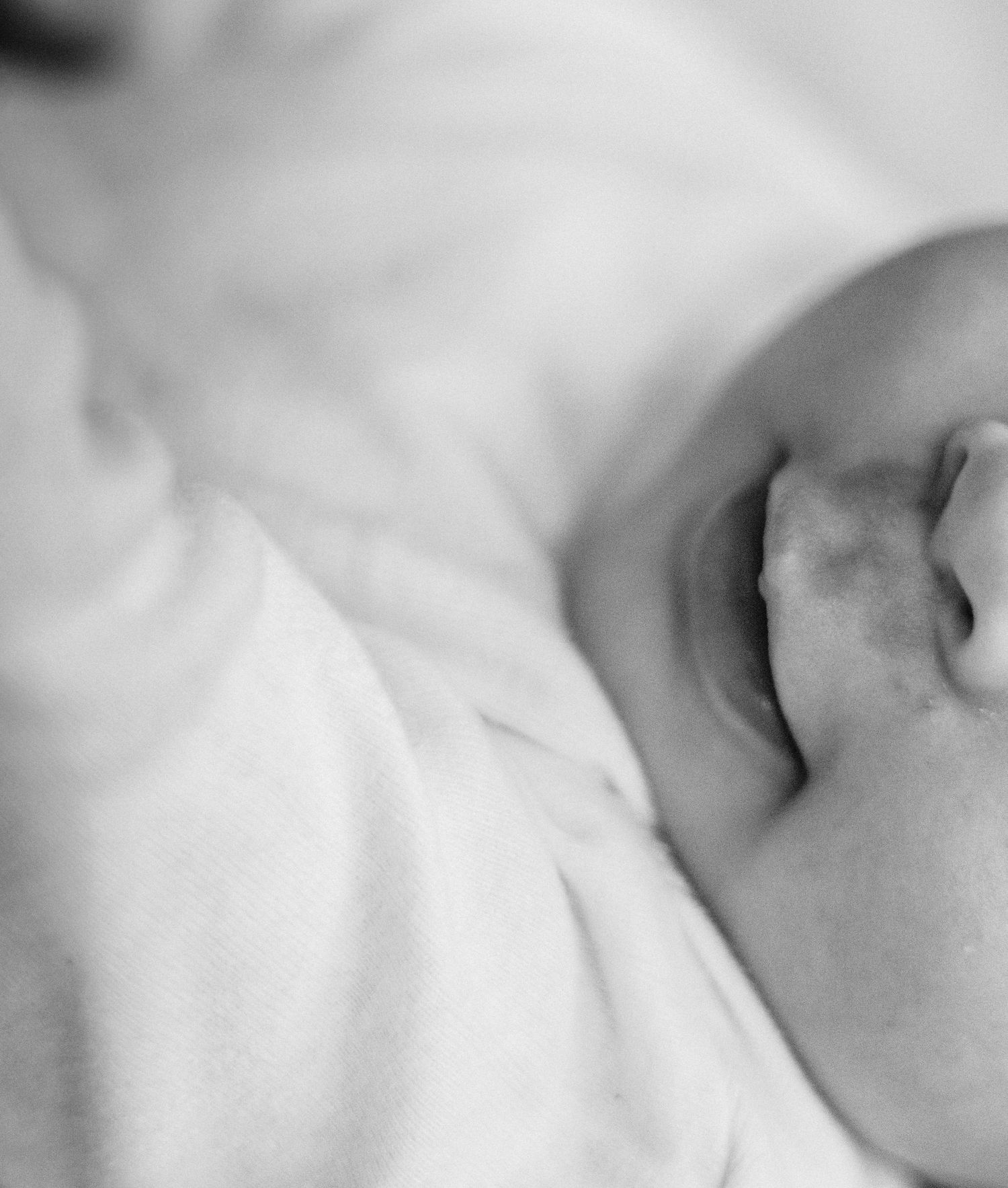 Black and white macro shots of peaceful sleeping expressions.