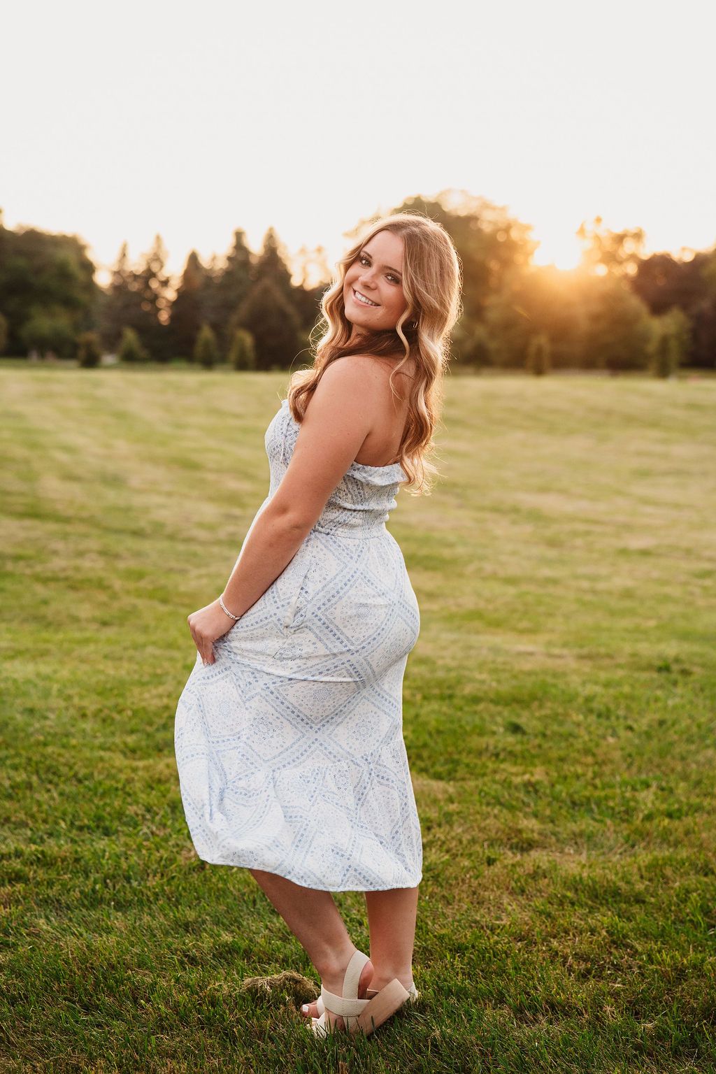 Golden hour senior photos at wildflower field near Canton and Ann Arbor Michigan