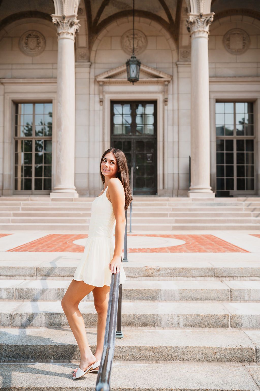 A series of photos featuring classical collegiate architecture with white stone columns and windows.