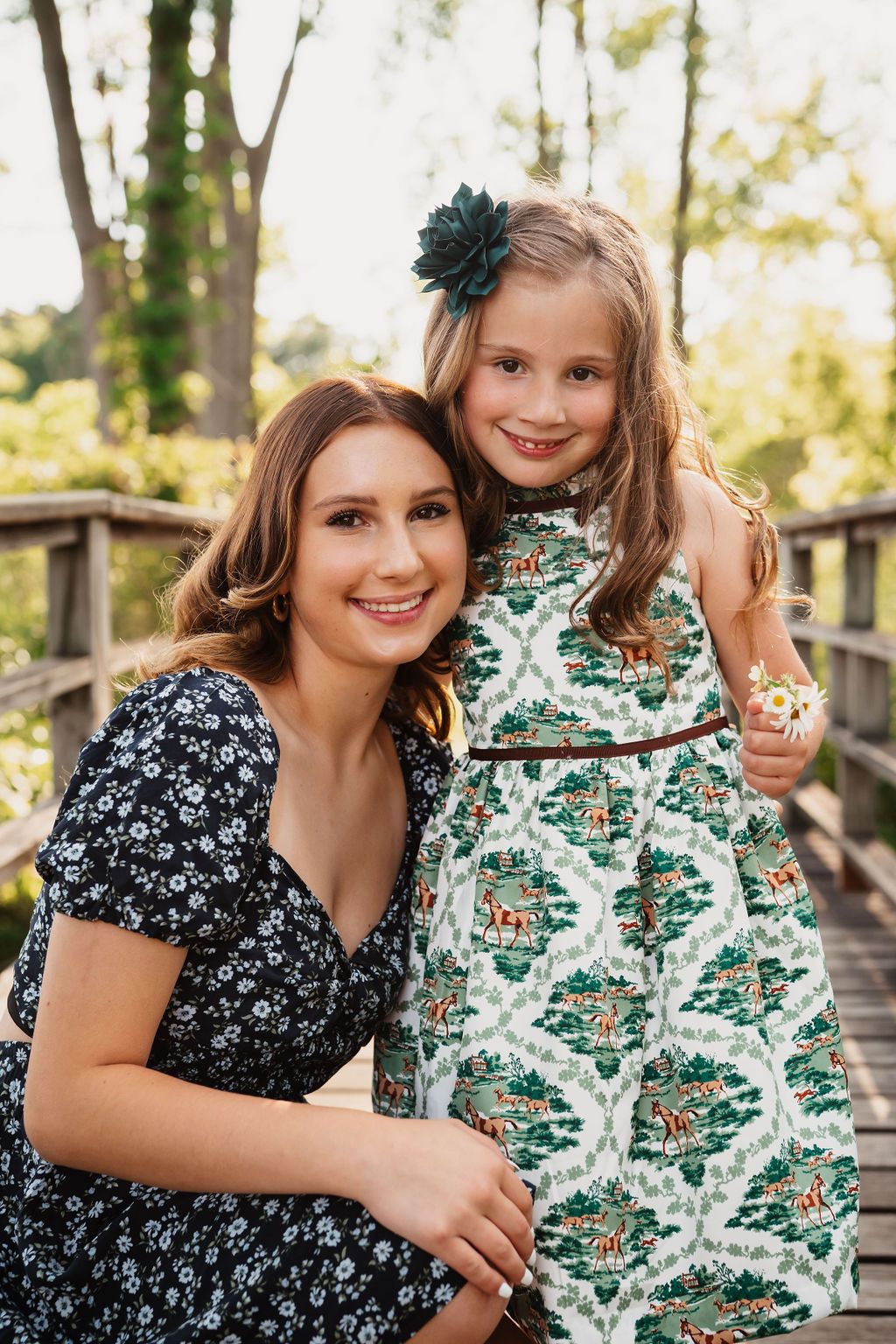 A series of outdoor portrait shots featuring floral and green patterned dresses against a natural wooded backdrop.