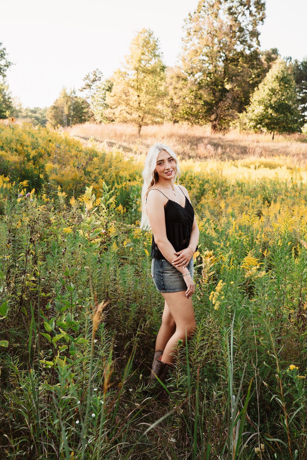 A series of outdoor portraits in a golden wildflower field during sunset with tall grass and natural lighting.