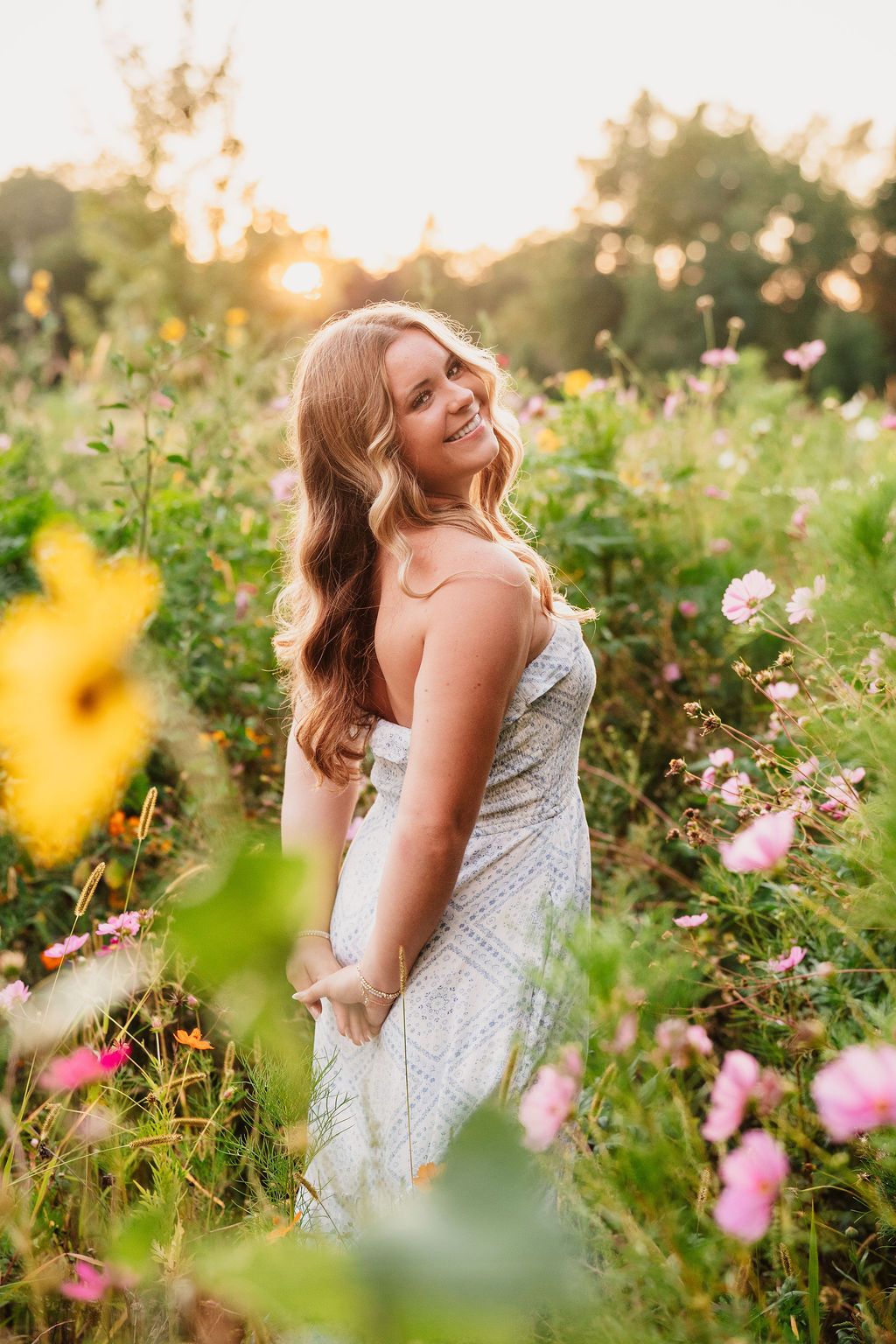 Golden hour senior photos at wildflower field near Canton and Ann Arbor Michigan