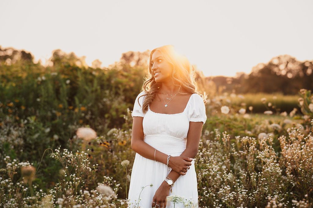 Golden hour senior photos at wildflower field near Canton and Ann Arbor Michigan