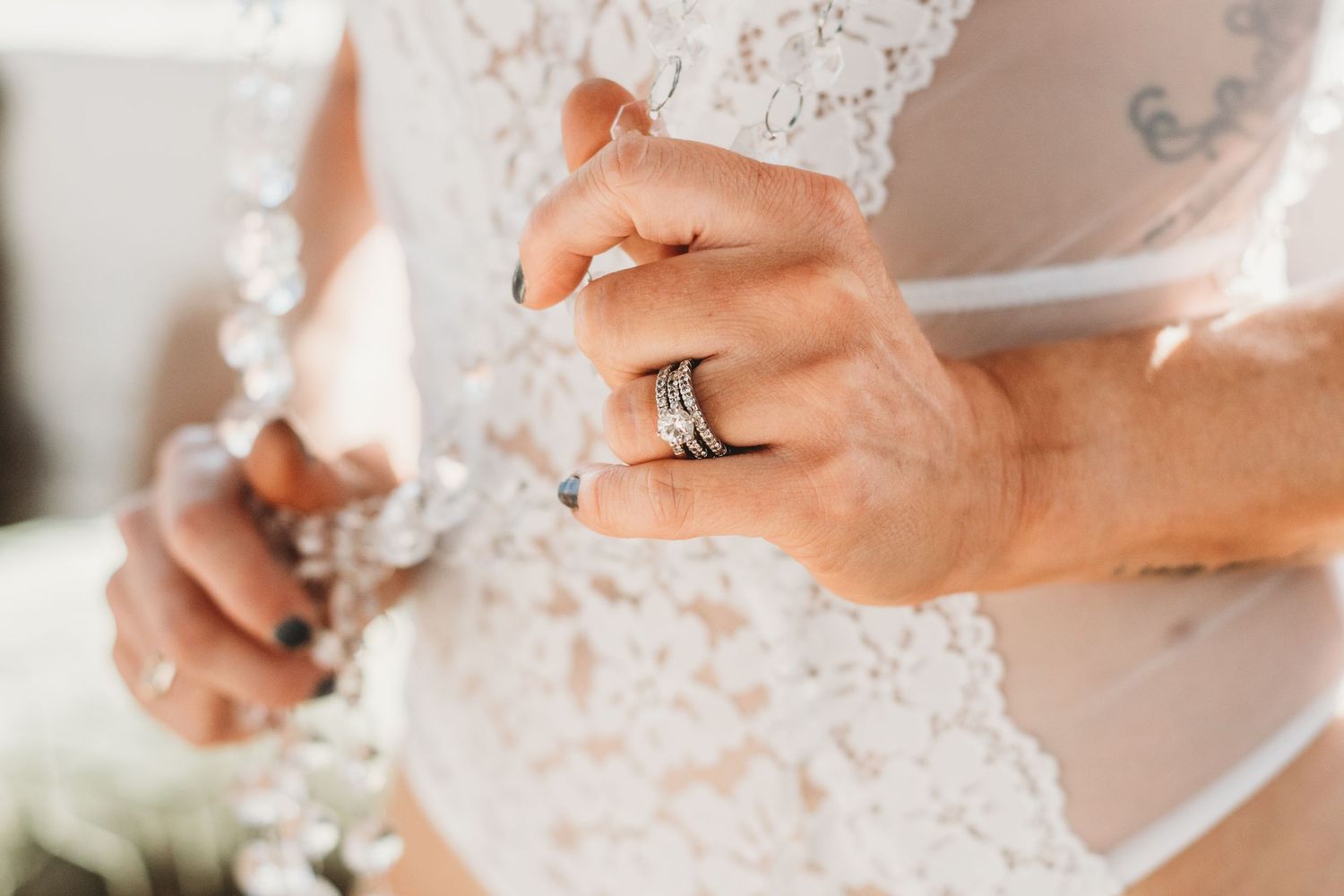 Charleston, Lowcountry Bride showing off her engagement ring during her bridal boudoir session