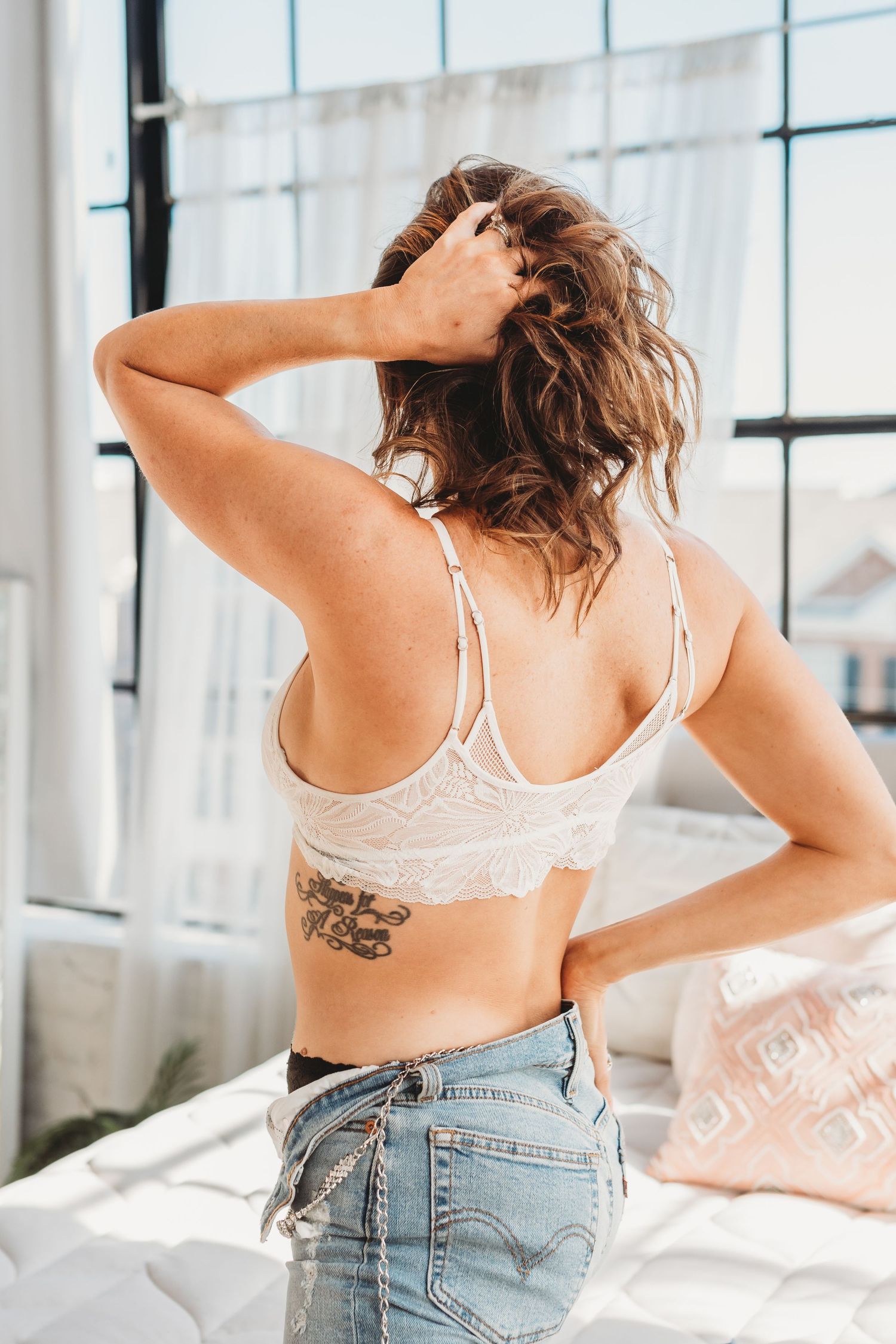 Lowcountry Boudoir client embracing her Bare. Bloom. Radiance