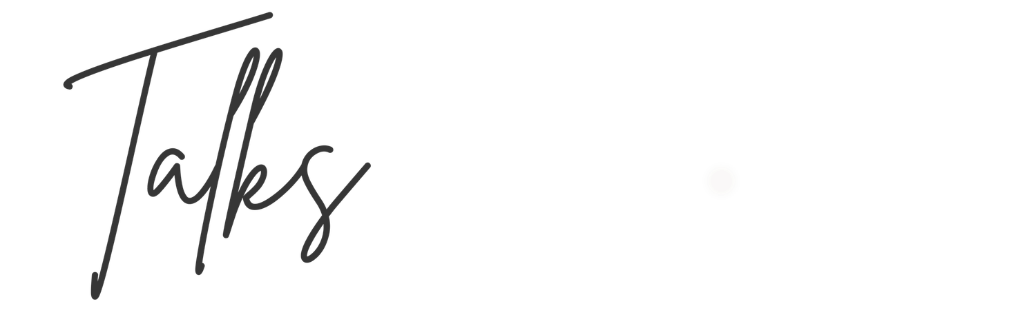 Elegant handwritten cursive script spelling Talks in dark ink on a white background.