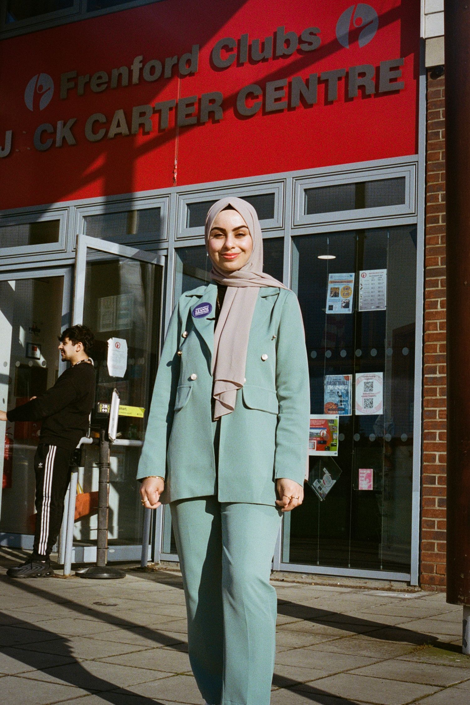 Stylish mint suit photographed outside the Evenford Club Carter Centre.