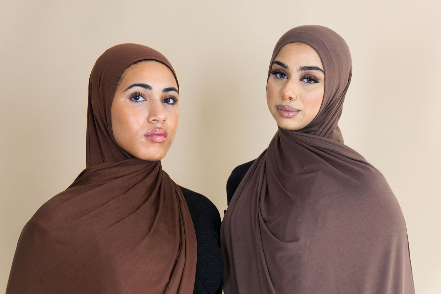 A series of photos showing women in brown and beige hijabs posing together against a neutral background.