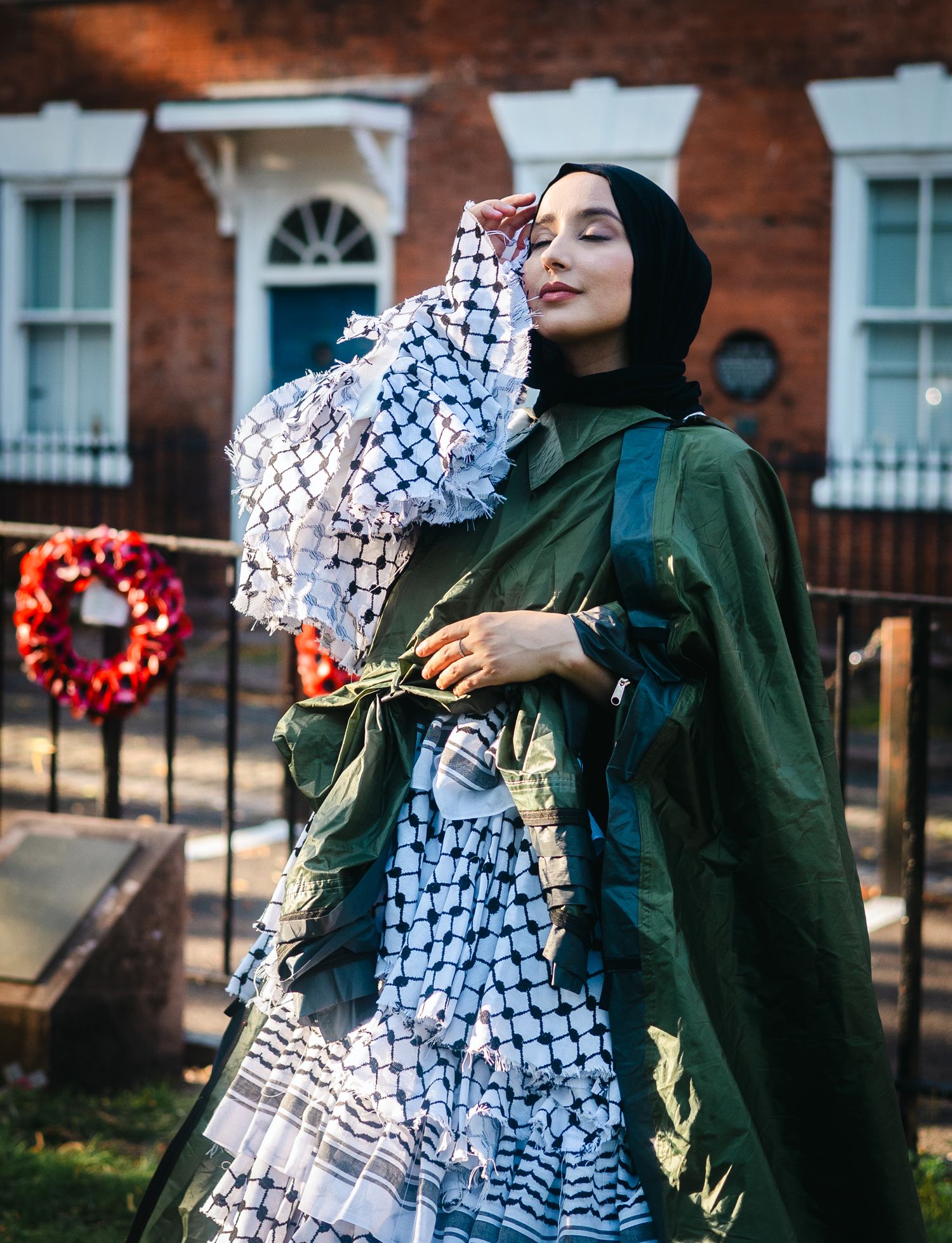 Person in a green hijab and traditional Palestinian keffiyeh scarf poses in an elegant fashion montage.