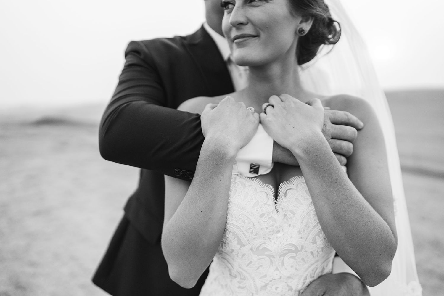 Candid emotional black and white portraits capturing joyful wedding moments.