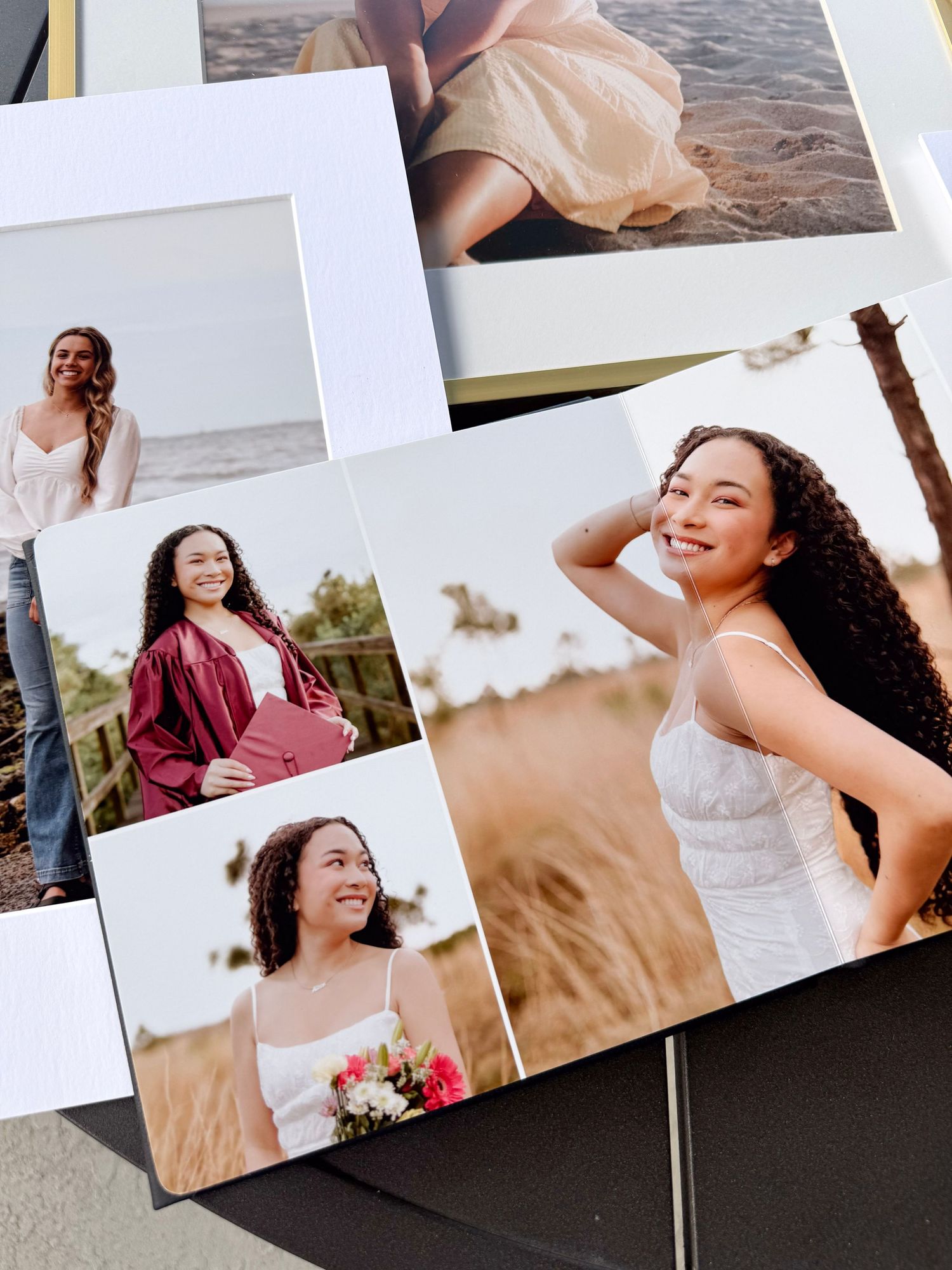 Collection of senior portrait photos showing a young woman in various outfits including graduation gown and white dress outdoors.