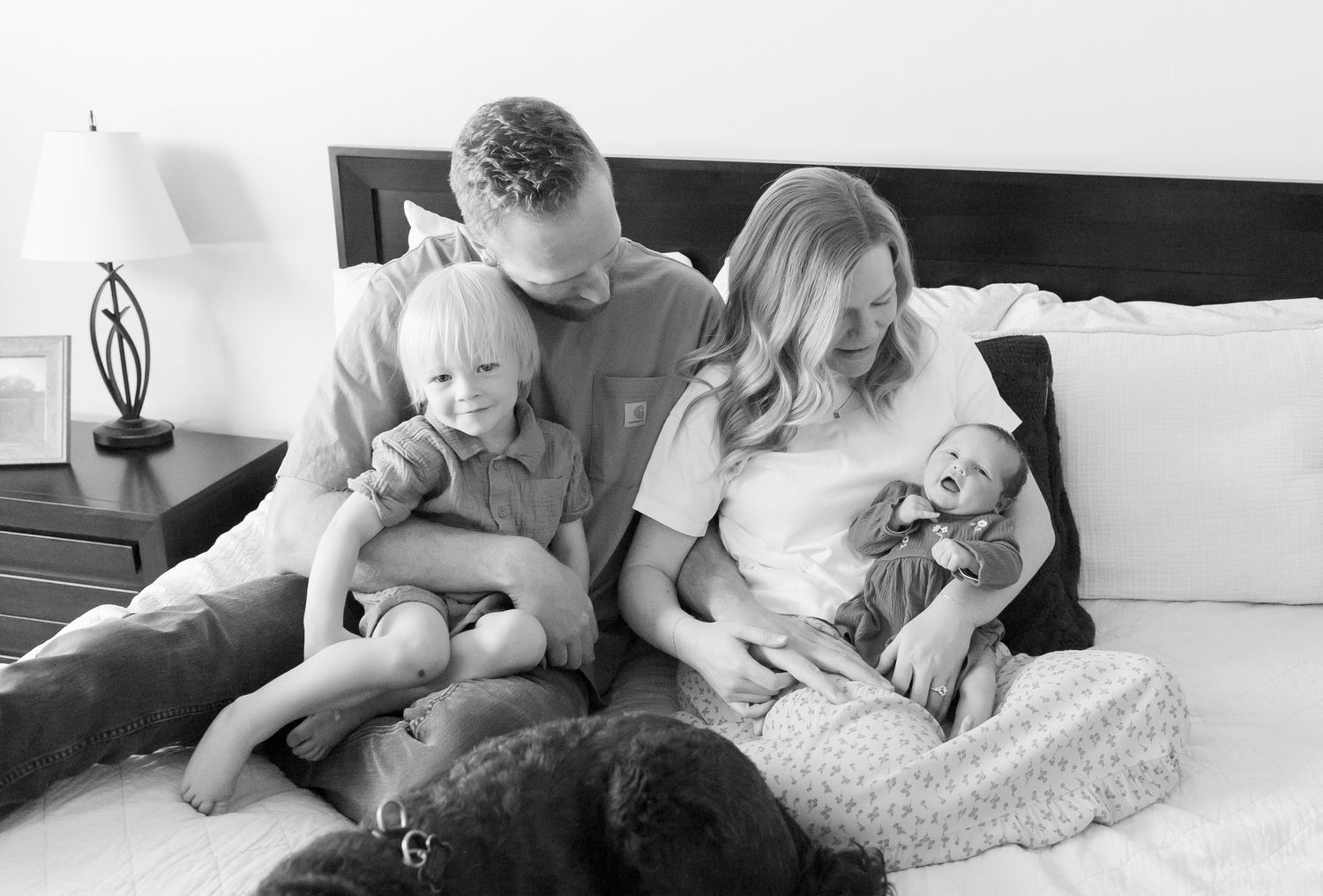 Family photo with two children in their home