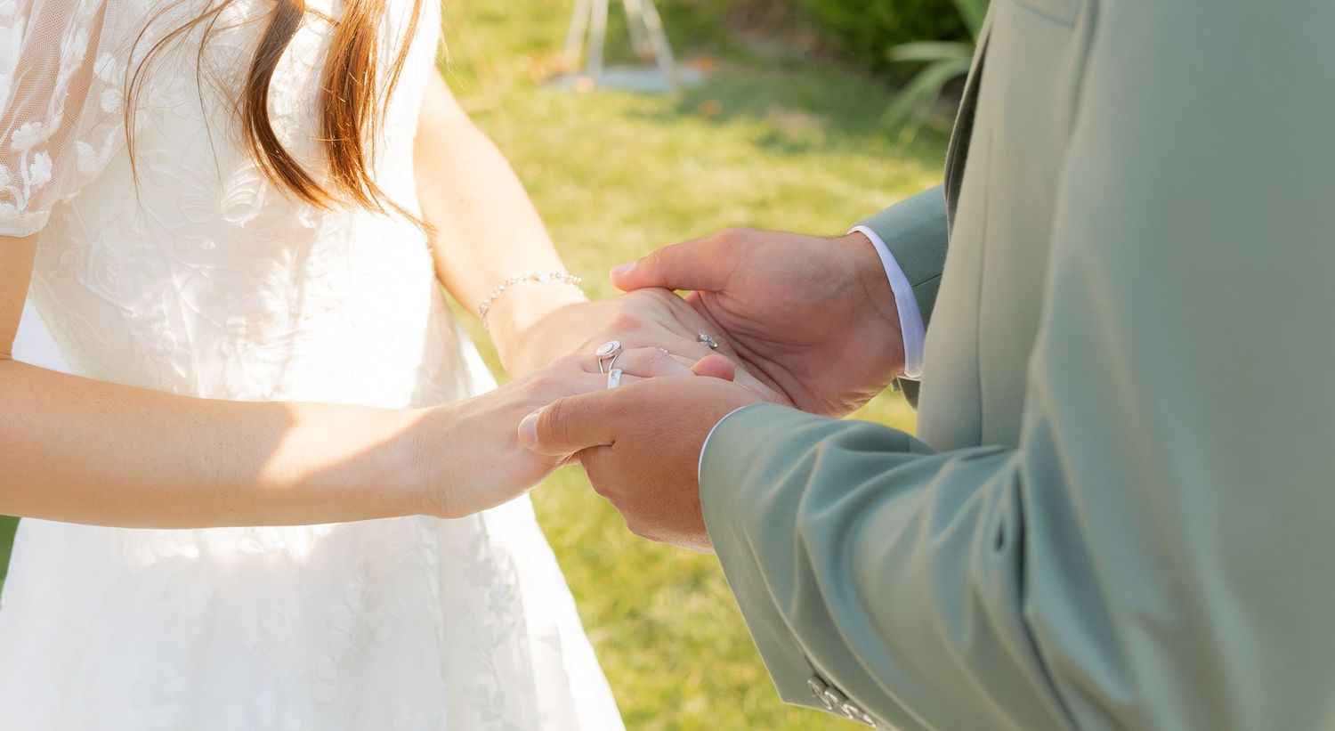 A bride and groom holding hands
