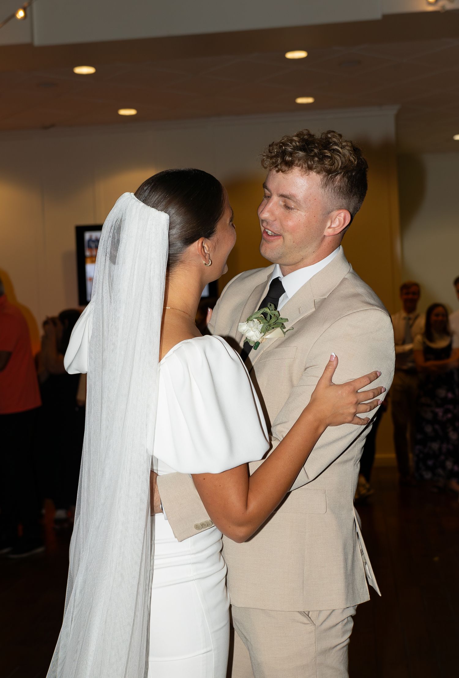 A bride and groom having their first dance