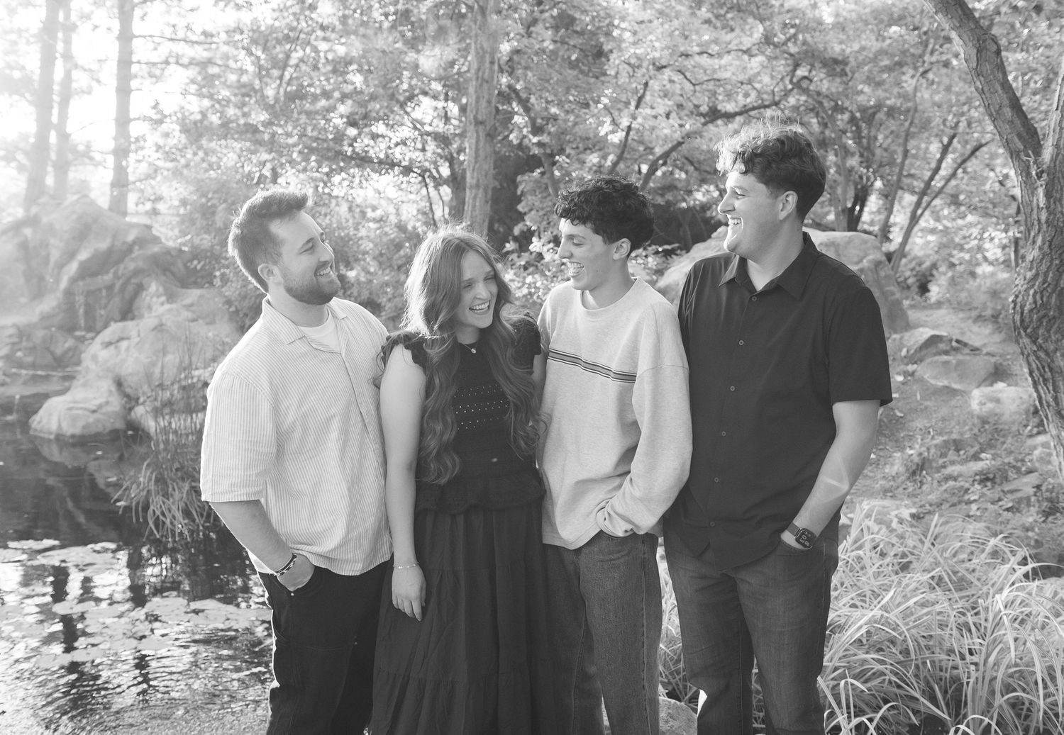 Family photo of four adult siblings