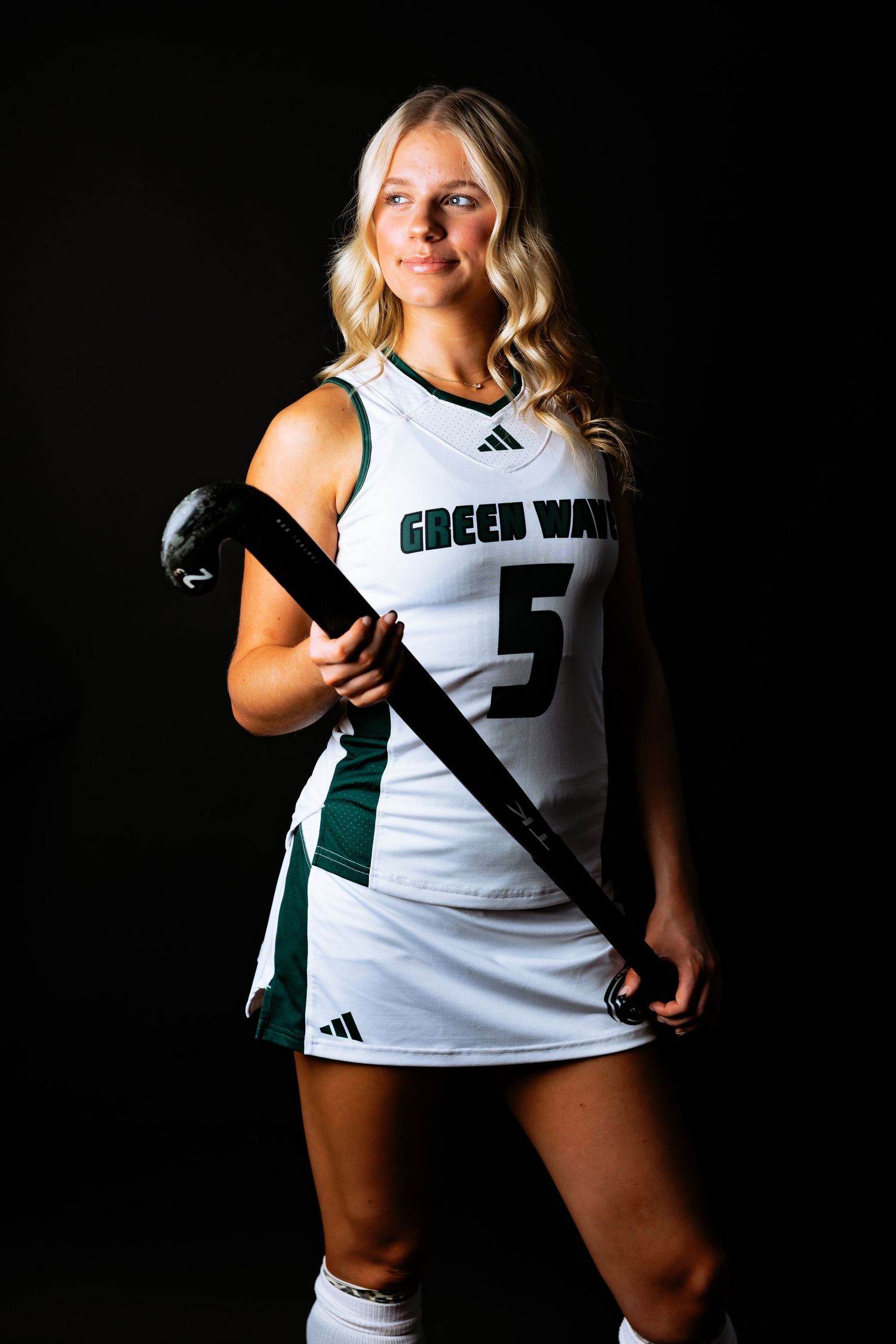 Sports portrait series showing player wearing white Adidas jersey with number 5 against black background in Keene, New Hampshire.