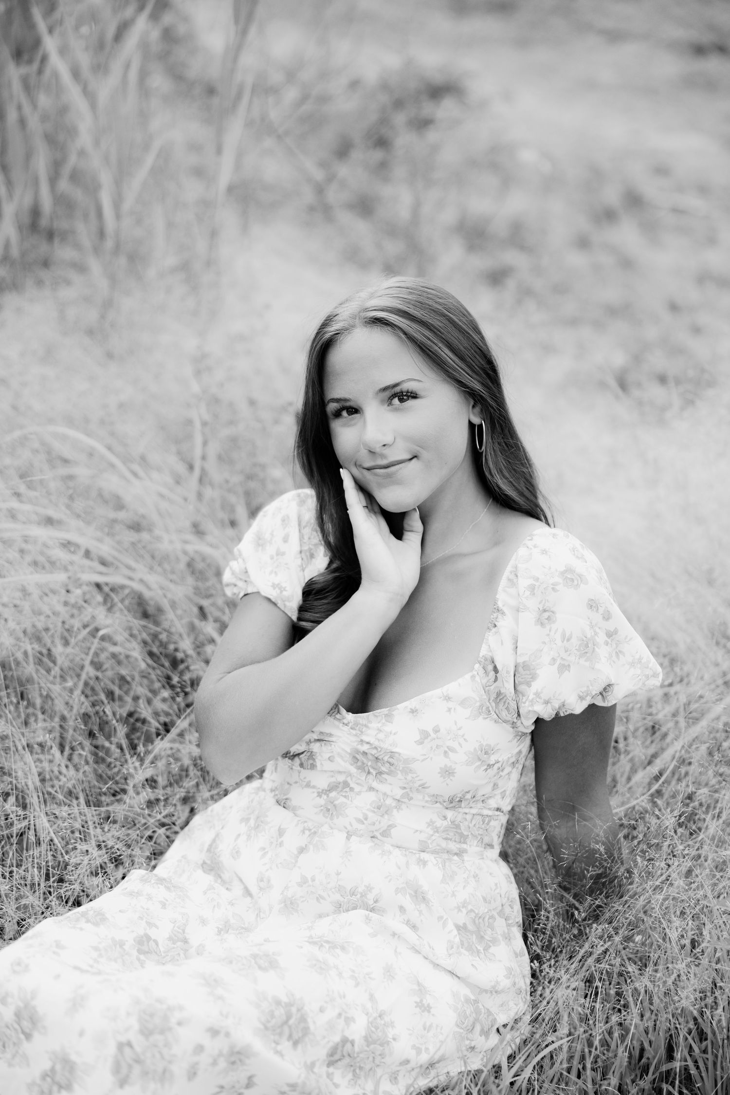 Black and white portrait series showing New Hampshire high school girl senior in a dreamy outdoor setting in Keene, NH