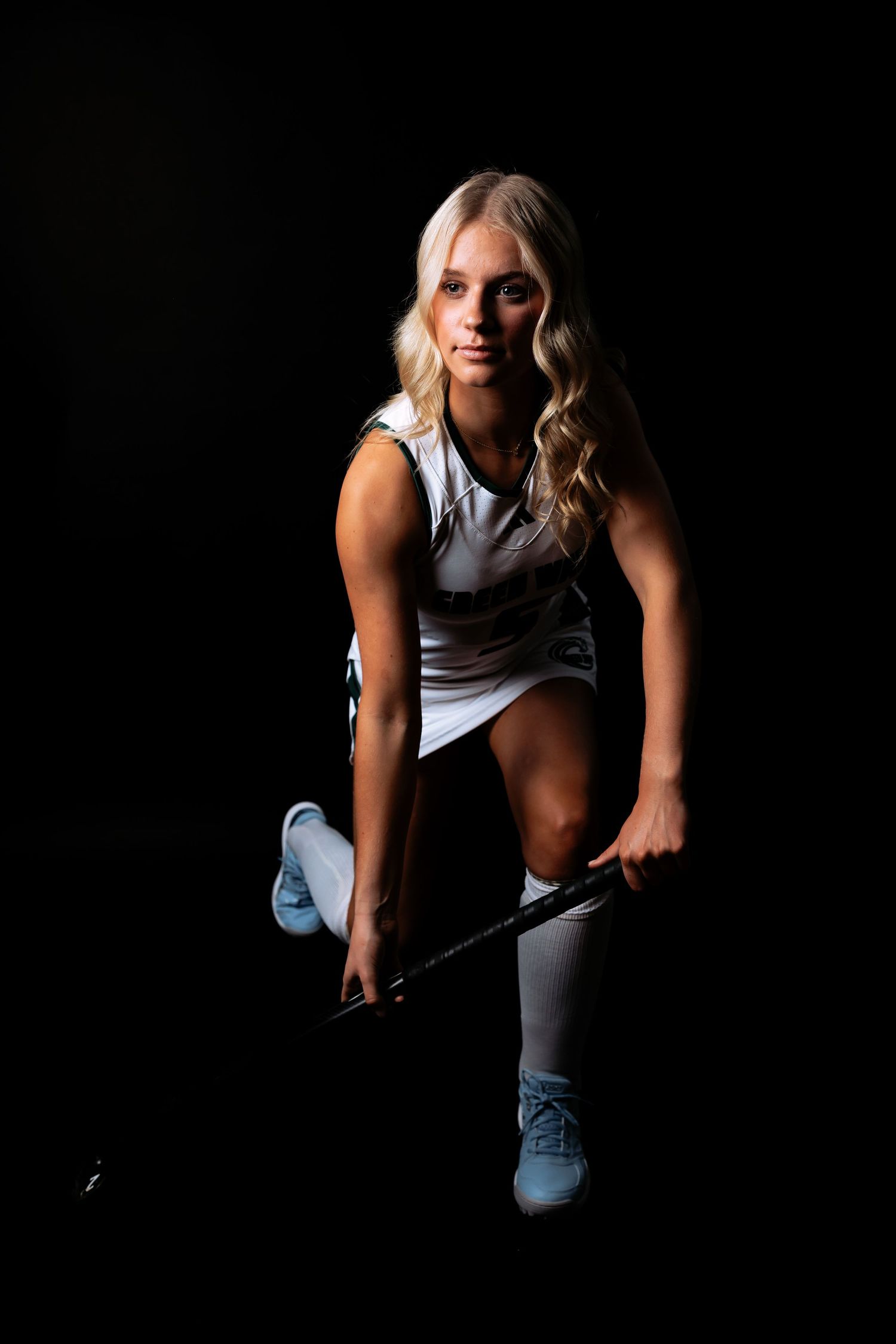 Dramatic studio sports photos of a high school senior.