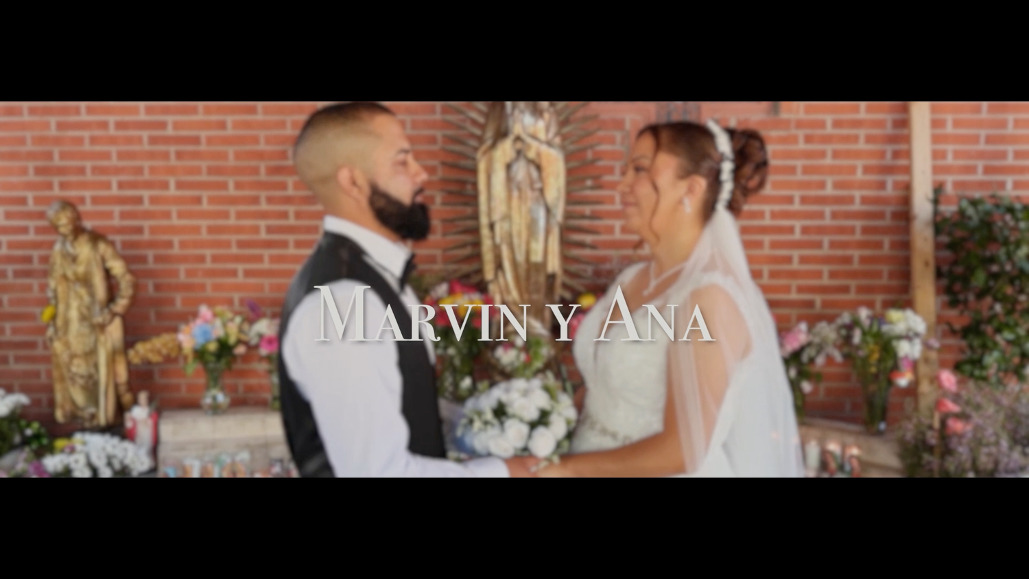 Bride and groom facing each other at the altar in a church decorated with flowers, title reads Marvin y Ana.