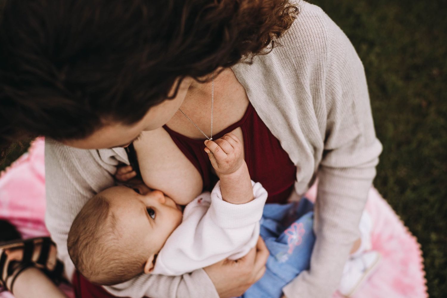Tender moments captured in soft natural lighting with muted tones.