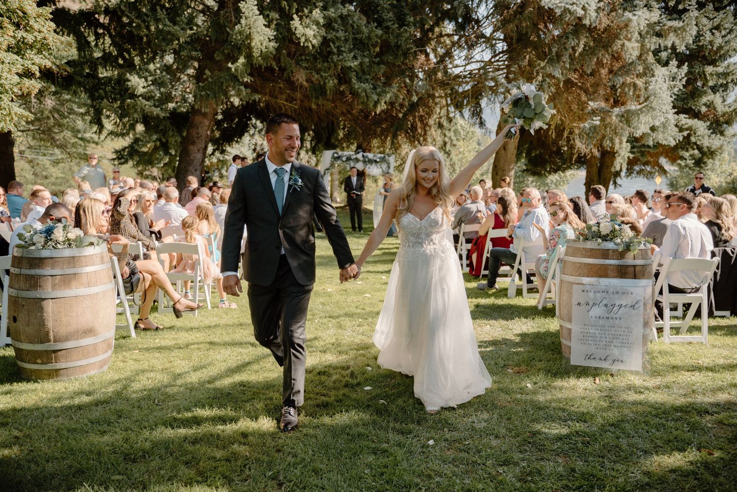Bride and groom just married walking down the aisle