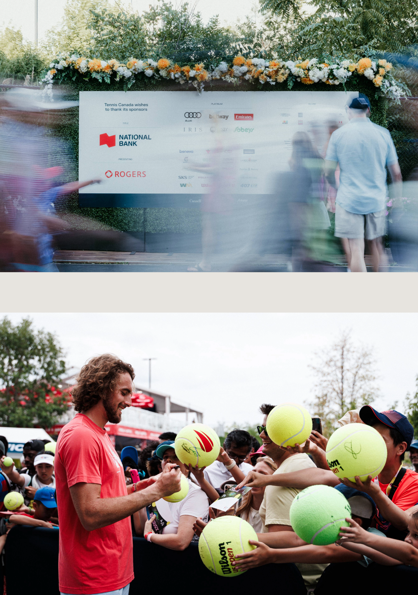 Tennis players sign autographs on oversized tennis balls for fans lined up at a tournament event.