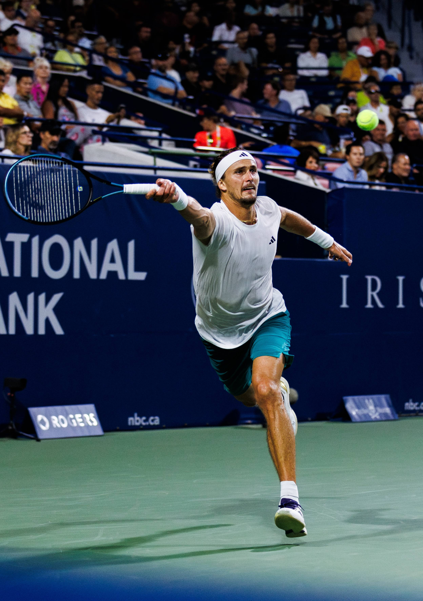 Dynamic action shots of tennis player stretching and serving during an intense match.