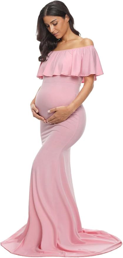 Elegant pink off-shoulder maternity gown with ruffle detail and mermaid silhouette featuring a floor-length train.