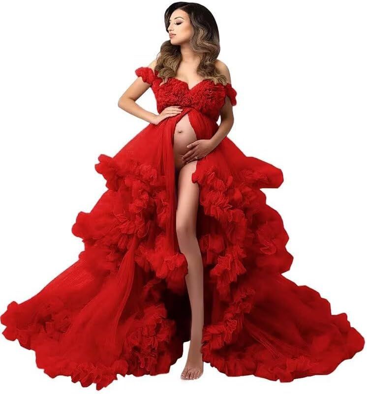 Dramatic red tulle maternity gown with ruffled cloud-like skirt and off-shoulder design for photography.