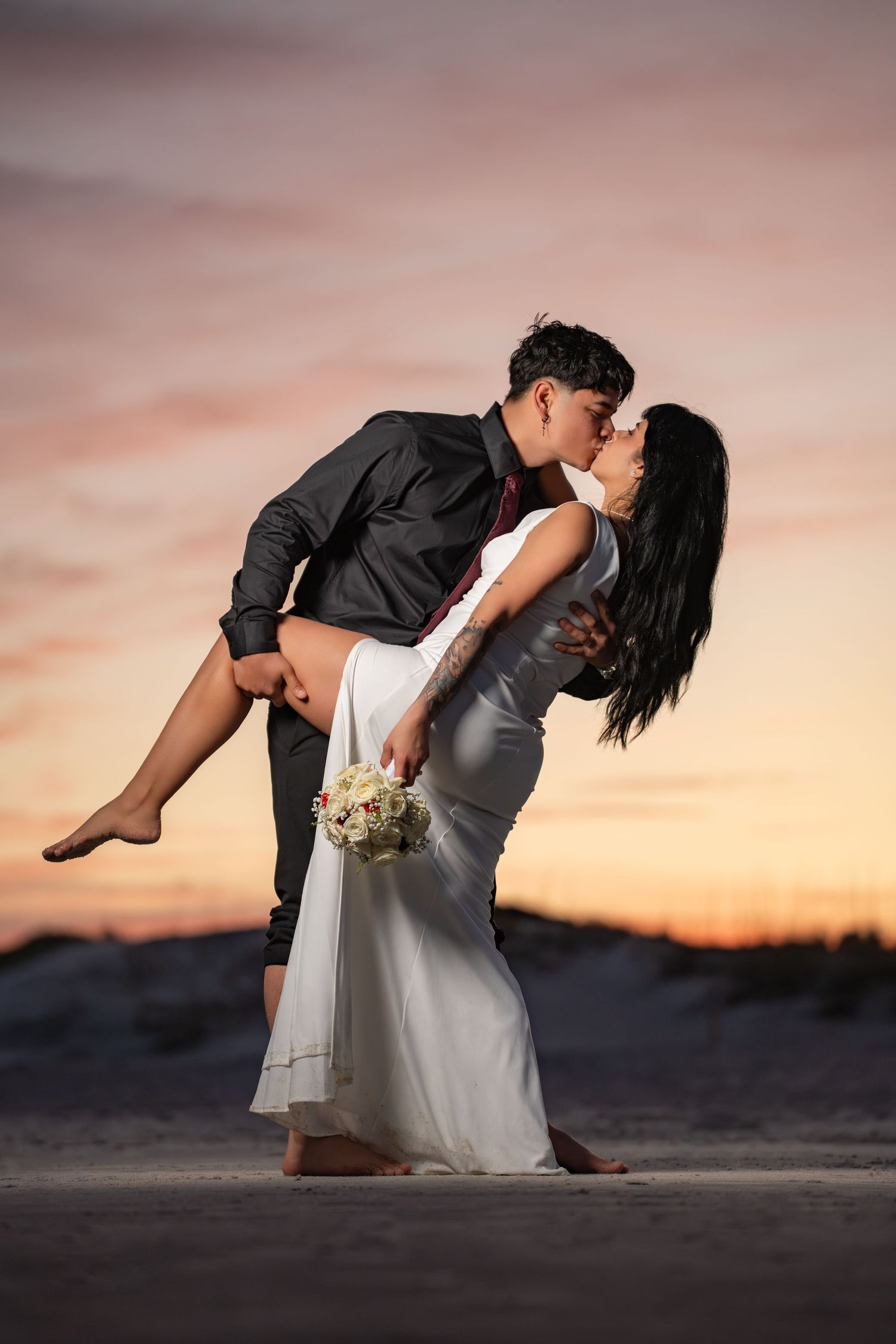 A couple shares a romantic dance dip pose against a vibrant sunset sky in multiple artistic shots.