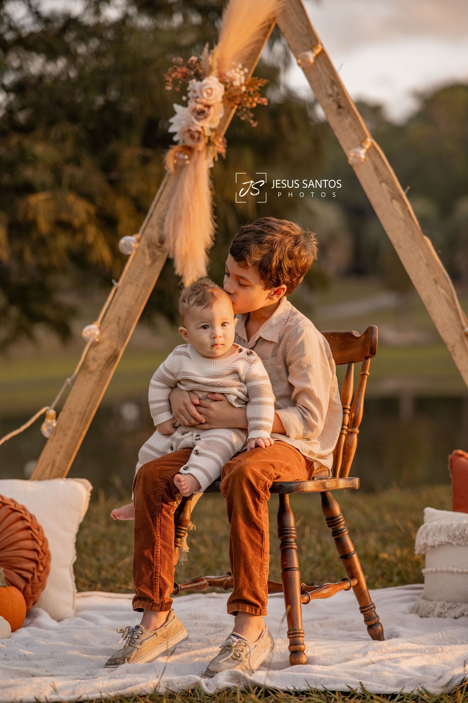 A heartwarming sequence of candid moments on a blanket outdoors with a wooden chair and warm sunset lighting.