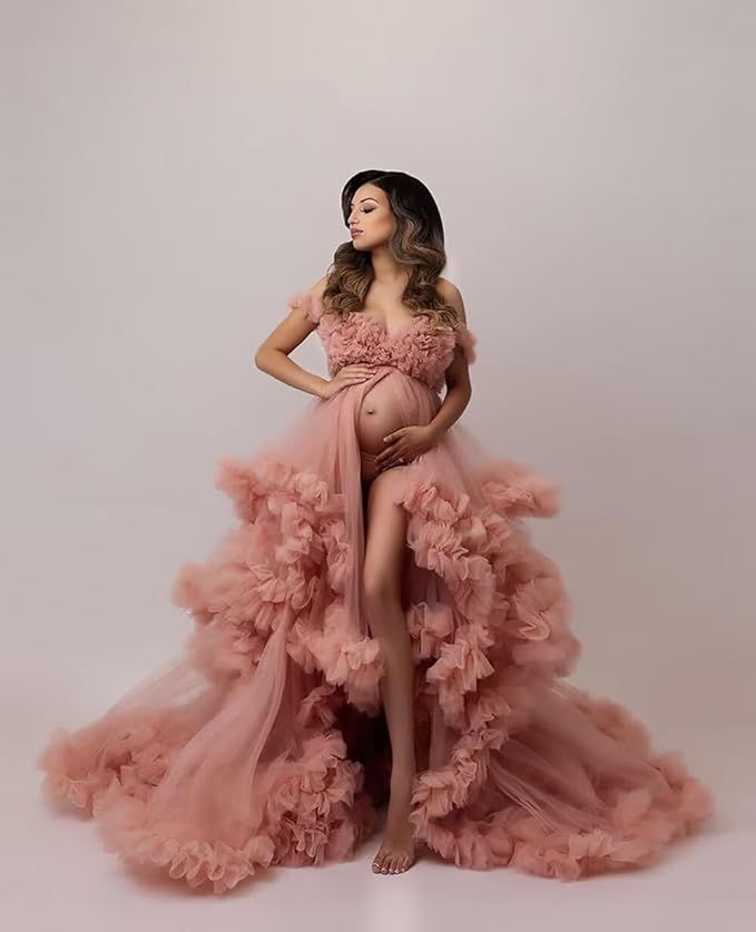 A flowing dusty rose tulle maternity gown with dramatic ruffles is captured in a series of elegant poses.