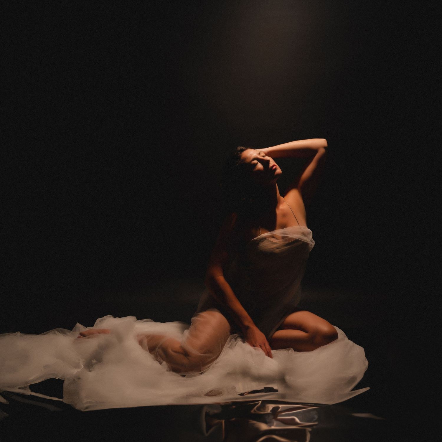 Nichole Bryant boudoir photography in ethereal settign with golden light