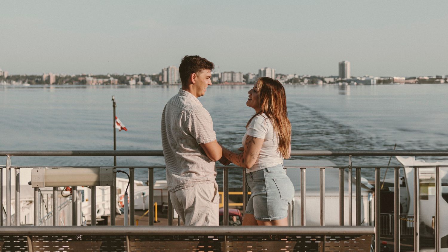 visiting couple takes wolfe island ferry from kingston ontario during a day trip