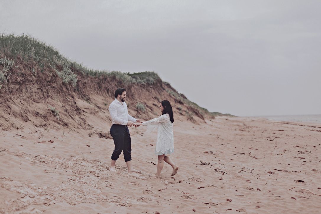 Greenwich Beach elopement couple on a rainy day.