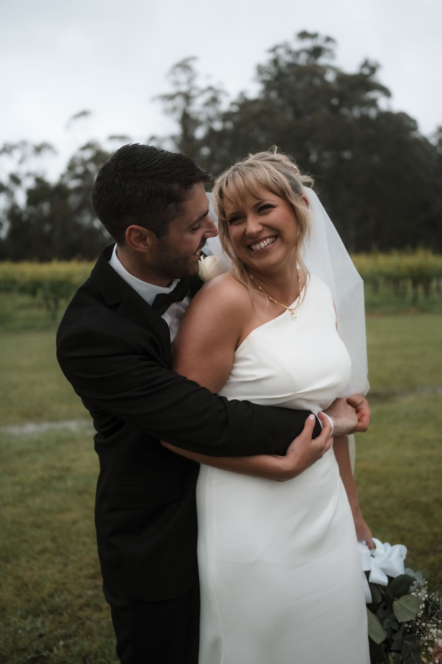 A romantic wedding moment captured in a series of photos showing a couple embracing in an outdoor field setting.