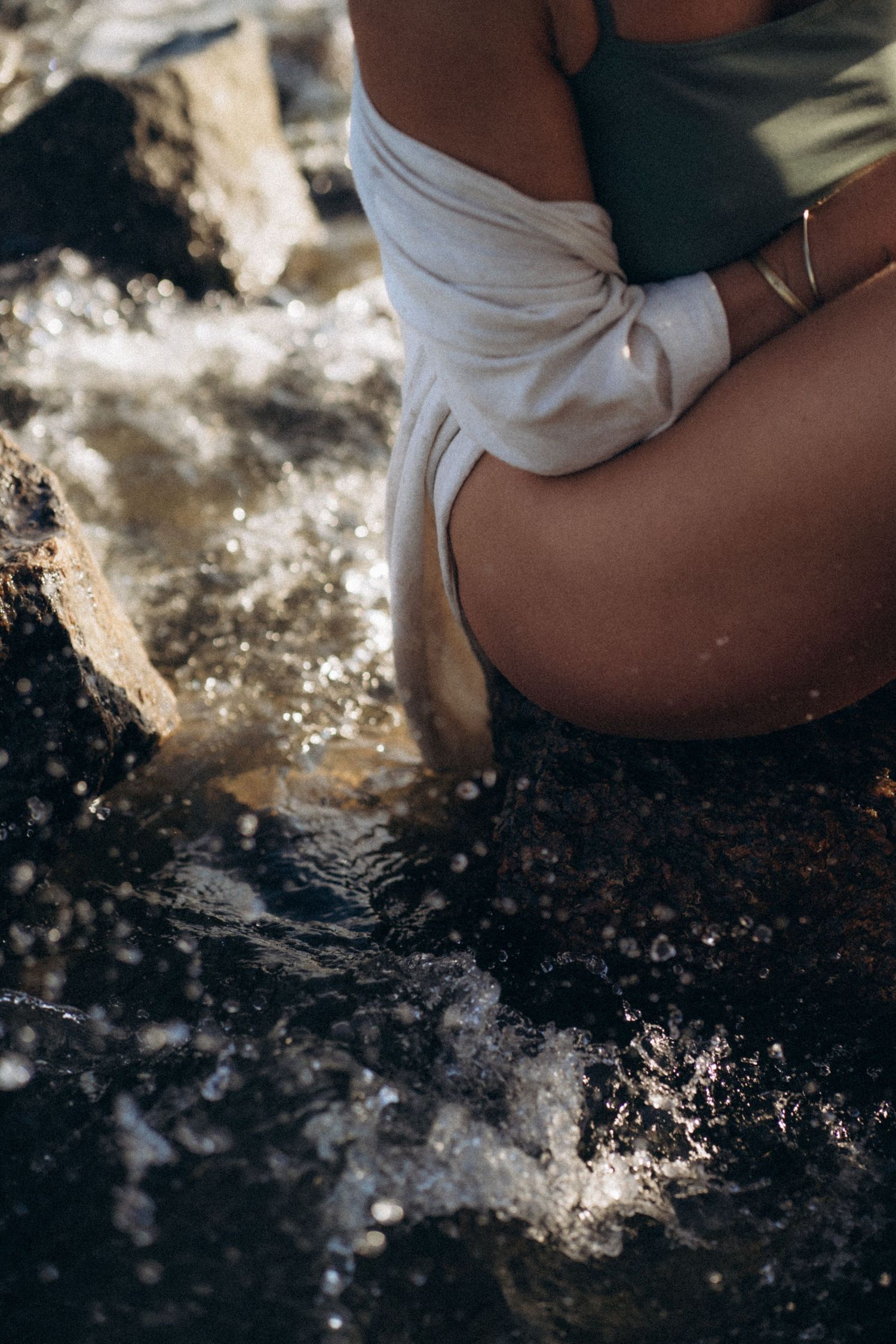 Womans hip on the water