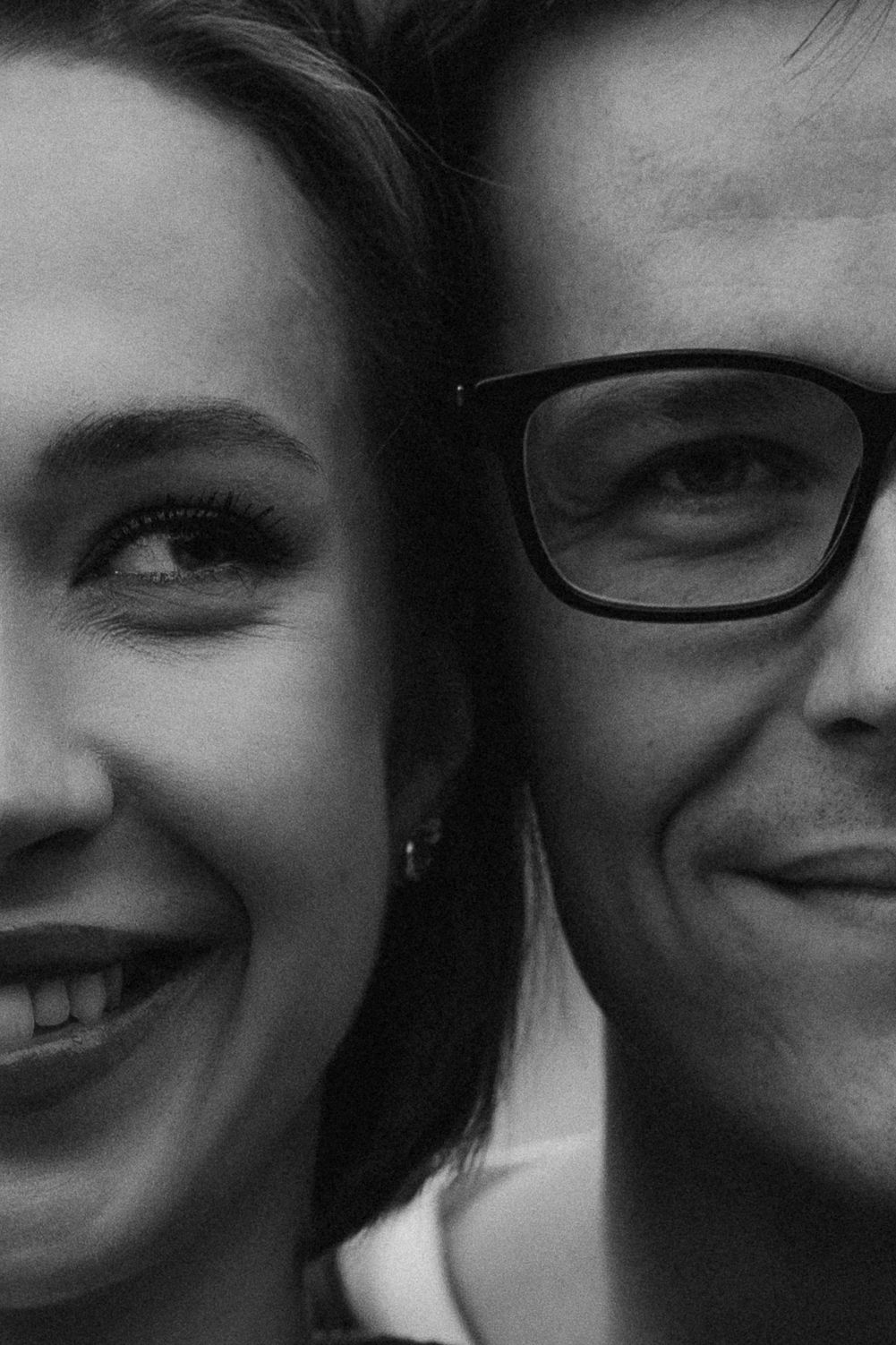 man and woman face to face black and white image